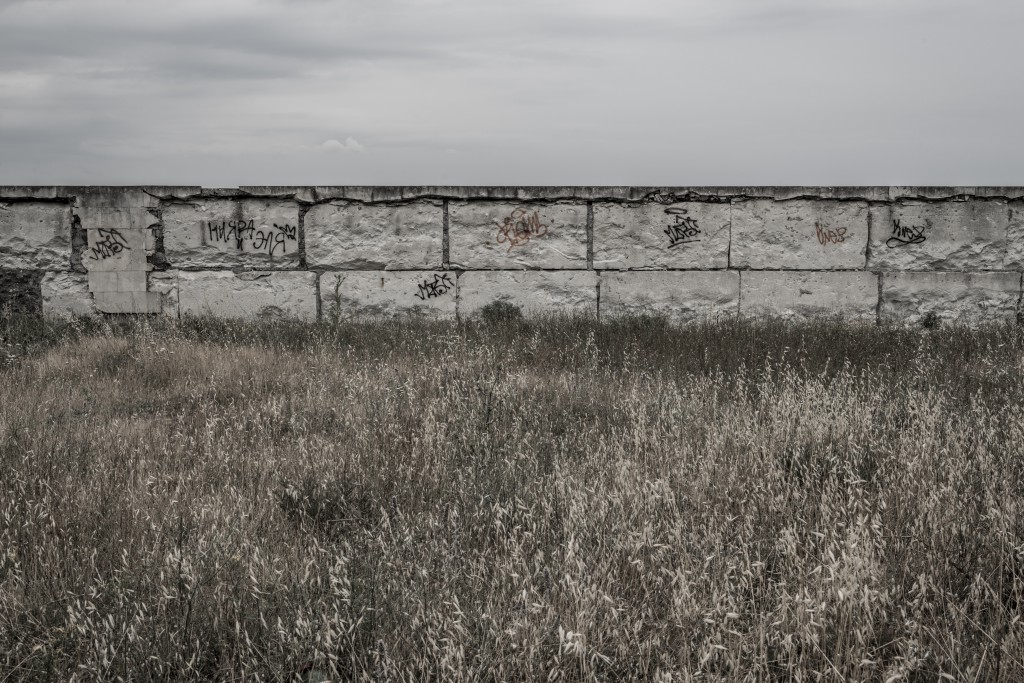 A wall on top of Cathcart's hill, near Sevastopol, where once stood a large British War cemetery, extensively destroyed during World War II. On this spot, there were several tombs of generals killed during the Crimean War. Inspired by a Roger Fenton's photograph of the Crimean War. Crimea, 19 June 2014.