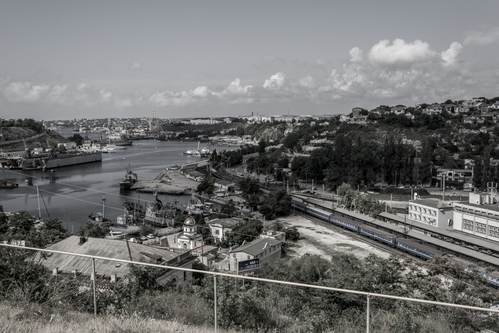 View of Peresyp, the South Bay and the Bomborsky Sloboda suburb taken from the site where the Gribok battery was positioned at the time of the Siege of Sevastopol (1854-55). Inspired by a Colonel Vladislav Klembovsky's photograph. Sevastopol, Crimea. 23 June 2014.
